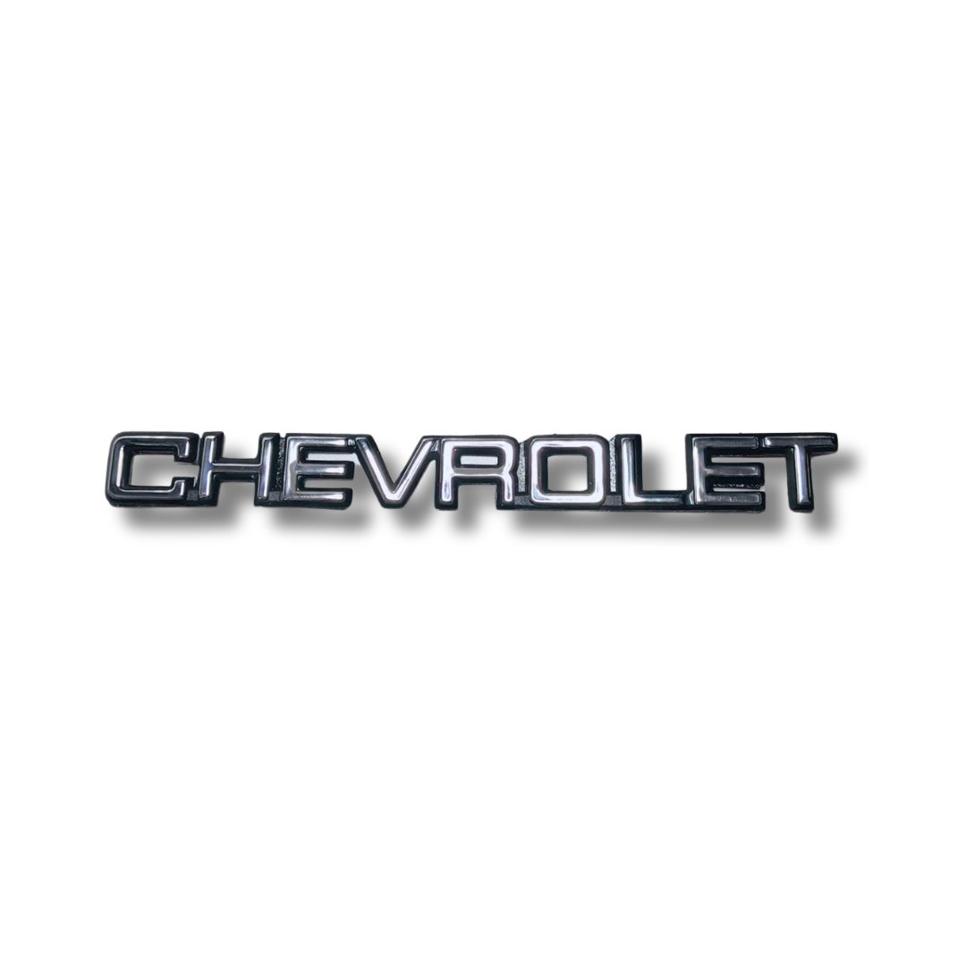 EMBLEMA INYECTADO CHEVROLET SPRINT TRASERO BAÚL LETRAS ADHESIVAS CROMADO Y NEGRO