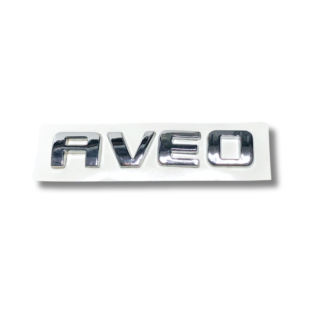 EMBLEMA INYECTADO CHEVROLET AVEO TRASERO LETRAS ADHESIVAS TONO CROMADO