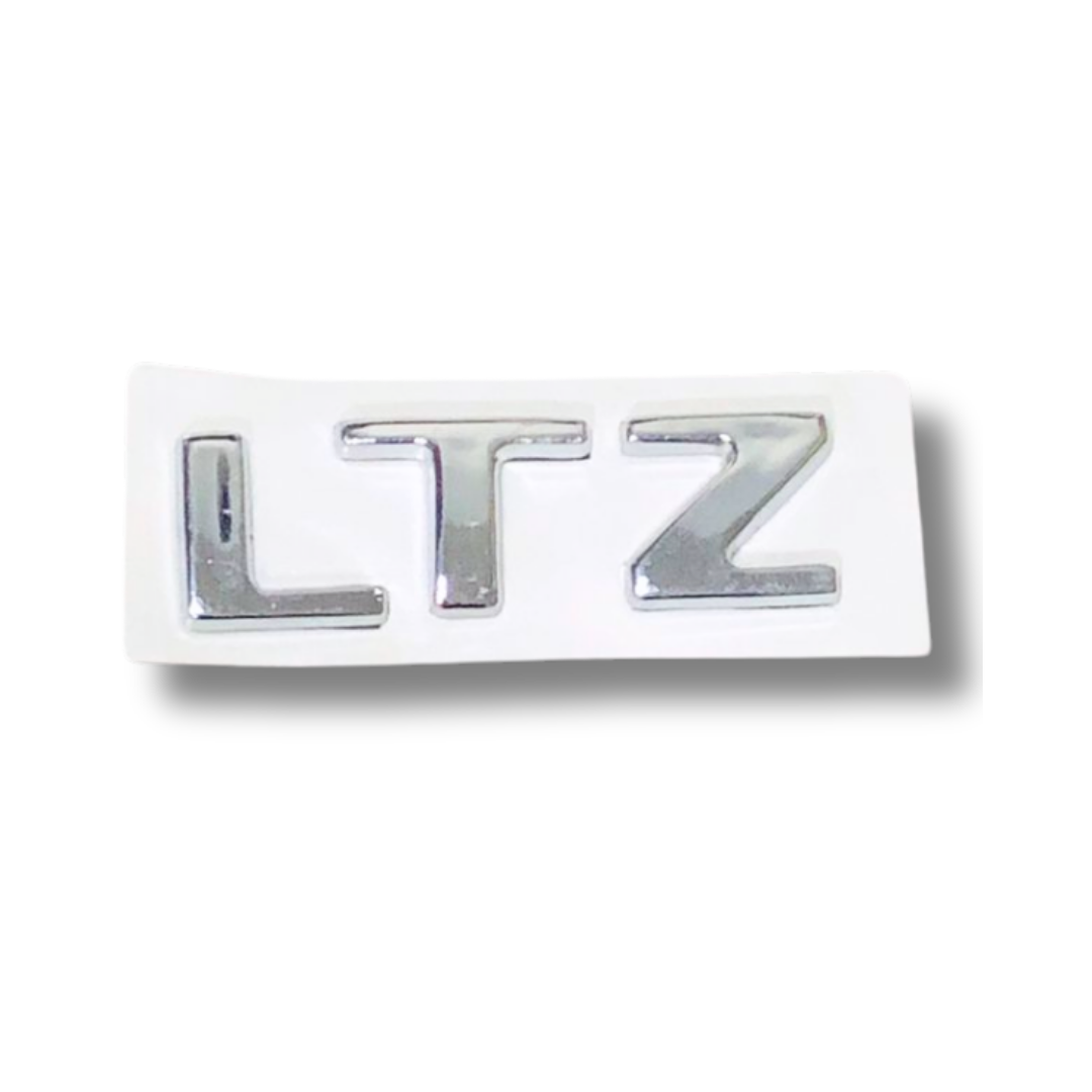 EMBLEMA INYECTADO CHEVROLET LTZ SAIL TRASERO LETRAS ADHESIVAS CROMADO