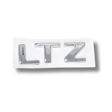 EMBLEMA INYECTADO CHEVROLET LTZ SAIL TRASERO LETRAS ADHESIVAS CROMADO