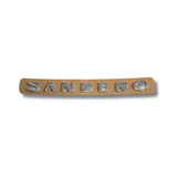 EMBLEMA INYECTADO SANDERO LETRA SUELTA