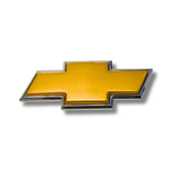 EMBLEMA INYECTADO TRASERO CHEVROLET AVEO / OPTRA / VIVANT N-200 / CAPOT SPARK 2005 DORADO